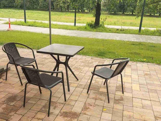 Completed concrete patio with outdoor seating area and clean paver layout in Eastlake, OH